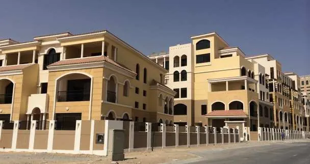 Completed courtyard and pools — photograph